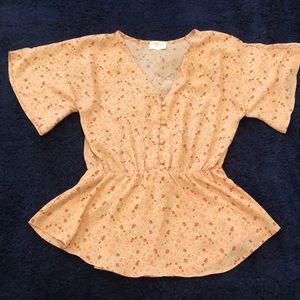 Sienna Sky short sleeve blouse